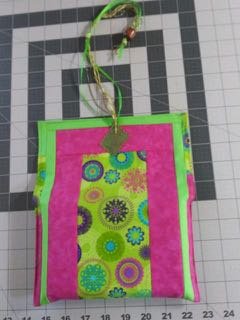 1135181537_patchworkdeckpouch1(1).jpg.7b33437bdec6a09202560be0389b8f05.jpg